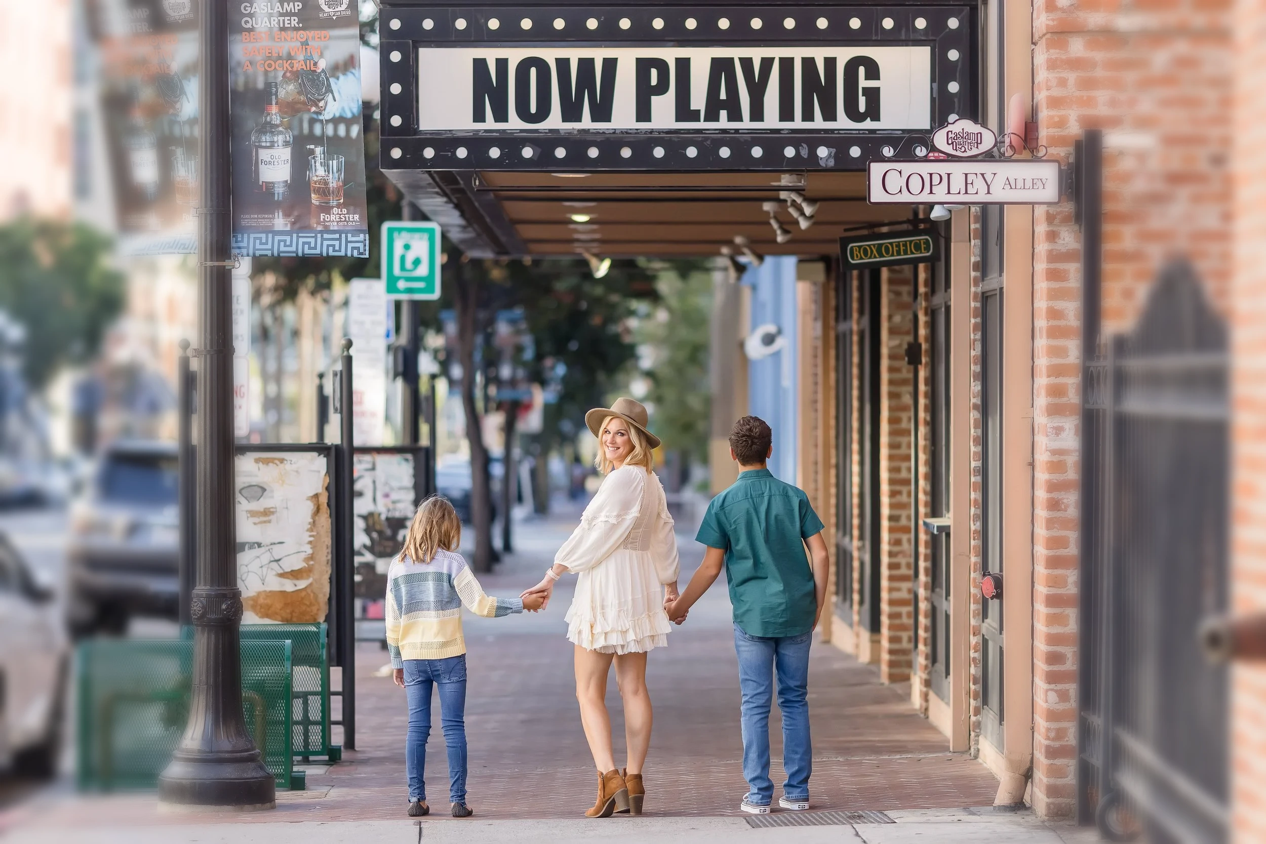 Coach Michelle Mitchell walking with her children in downtown San Diego, high-conflict co-parenting coach