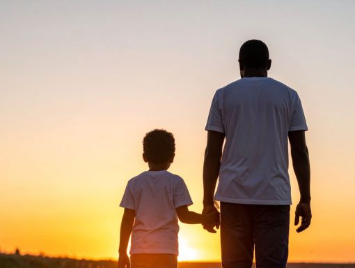 Father and son walking hand in hand at sunset, evoking the child-centered focus that Parent Coordination is built to protect